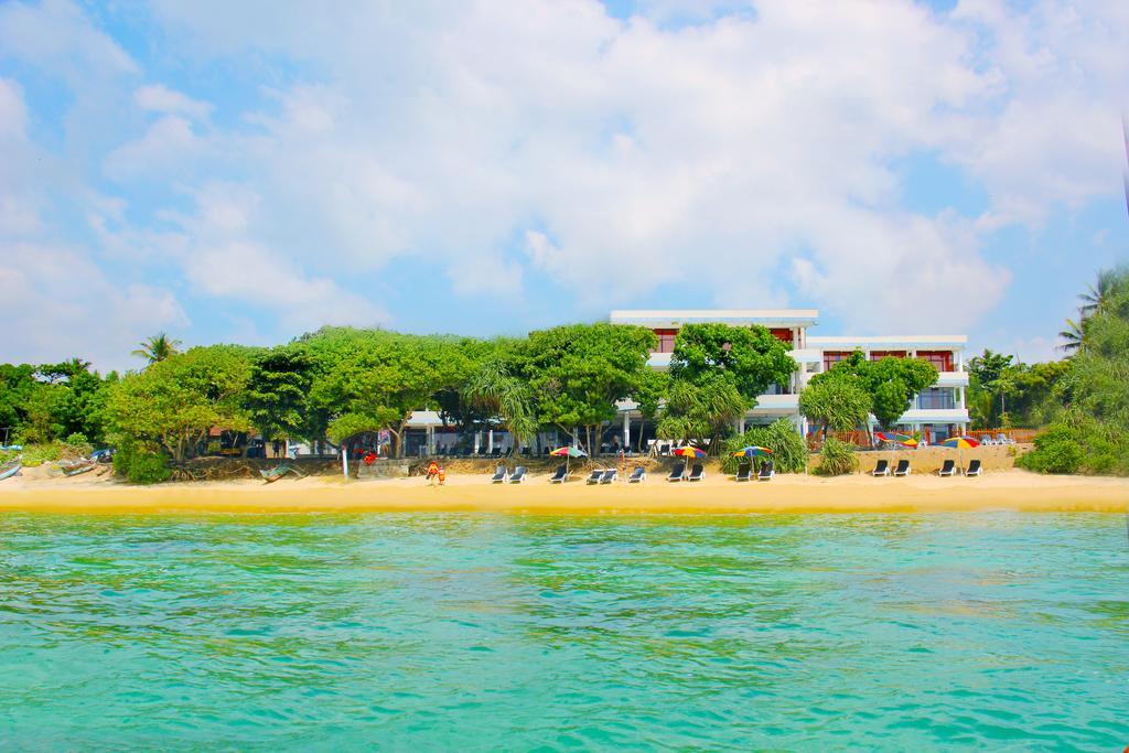 Paradise Beach Resort & Diving School Мириса Екстериор снимка