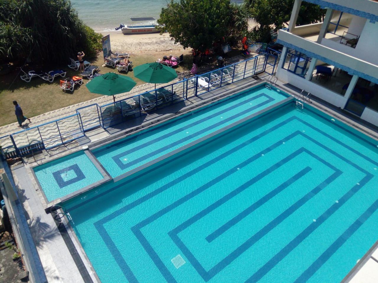 Paradise Beach Resort & Diving School Мириса Екстериор снимка